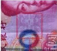 网友称百元人民币上现“跪拜猫”图案(图)