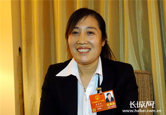 全国人大代表李素环。记者胥文燕 摄 全国人大代表李素环。记者胥文燕 摄