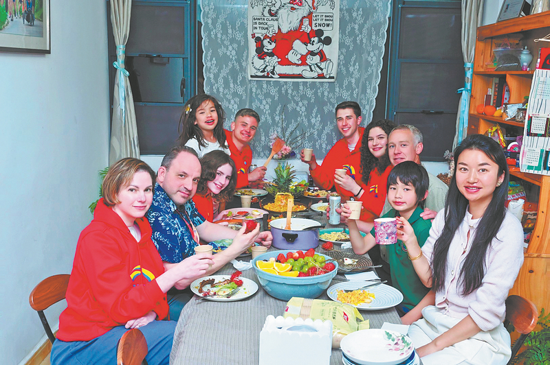 Jesse Millett (third from right) hosts several American guests at his home in Kunming, Yunnan province, on Jan 20. CHINA DAILY