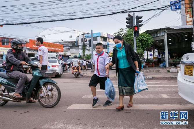 (国际疫情)(5)老挝进一步放松防控 多数学生复课