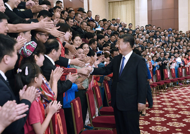 8月27日，在第十三届全国运动会即将开幕之际，中共中央总书记、国家主席、中央军委主席习近平在天津会见全国群众体育先进单位、先进个人代表和全国体育系统先进集体、先进工作者代表以及在本届全运会群众比赛项目中获奖的运动员代表，并发表重要讲话。_副本.jpg