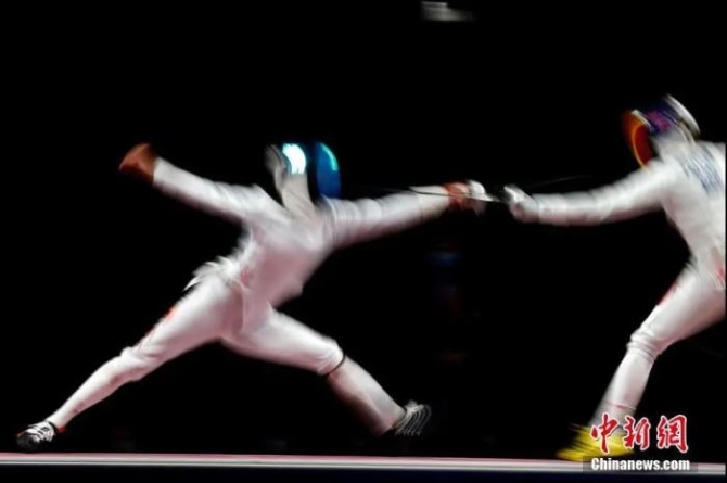 图为孙一文在比赛中。<a target='_blank' href='http://www.chinanews.com/'>中新社</a>记者 富田 摄 点击进入下一页