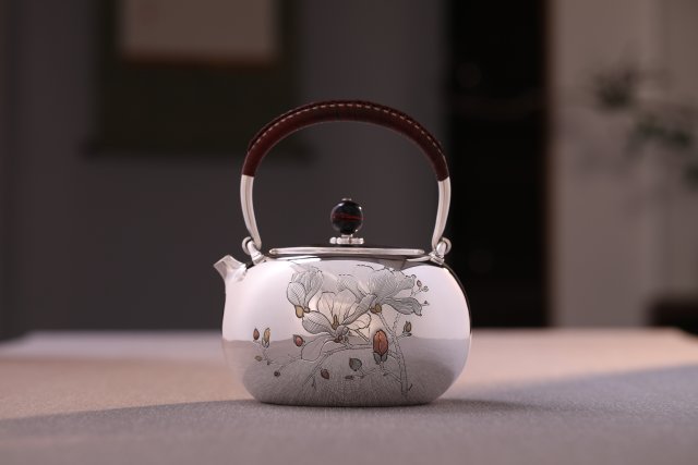 新华村 李小白银器.jpg