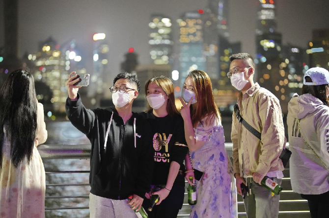 【组图】上海全面有序复工复产复市 街头“烟火气”回归