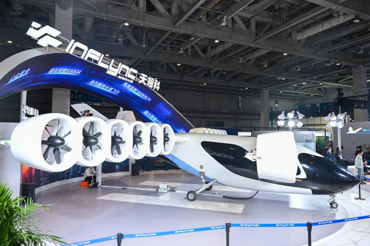 An eVTOL product of Inflync, which made its global debut, is pictured at the Automobile and Smart Mobility exhibition area during the 8th China International Import Expo (CIIE) in east China's Shanghai, Nov. 6, 2025. (Xinhua/Chen Haoming)